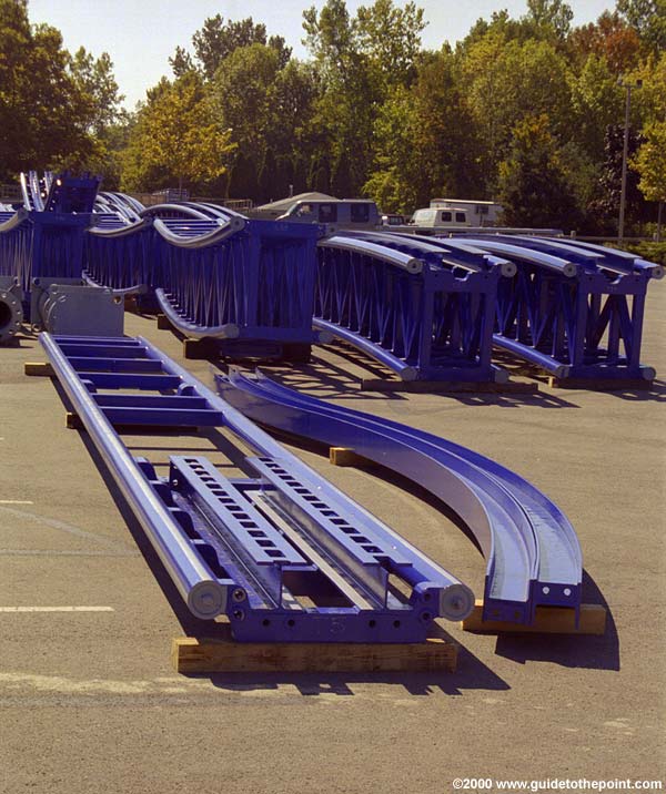 Load station track and end of lift sled track