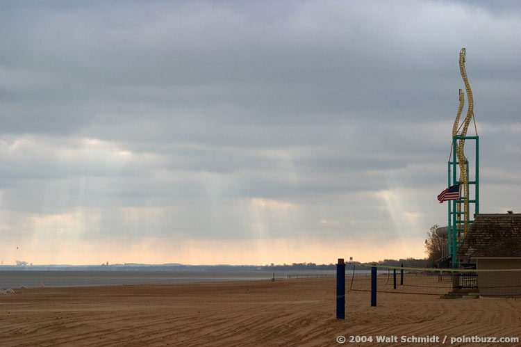 The Cedar Point Beach and Wicked Twister sit against a backdrop of crepuscular rays