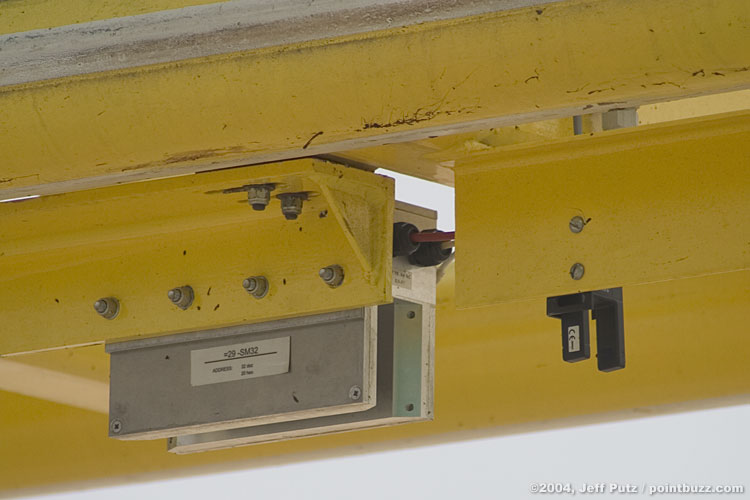 This light sensor counts the spaces in the comb on the train to measure its speed.