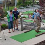 Golfers take on the impossible 18th hole.